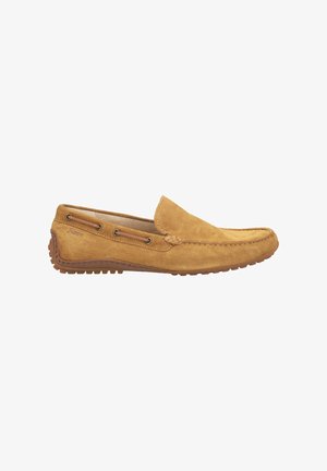 Suede loafers in tan with a low-profile design, featuring stitching accents, side lacing, and a textured rubber sole.