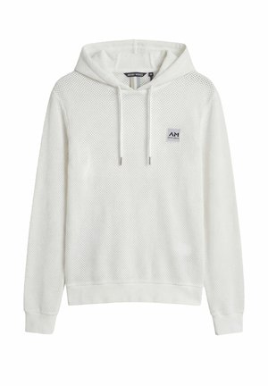 Witte longsleeve mesh hoodie met trekkoorden en klein logo-opzetstuk aan de voorkant, geribbelde manchetten en zoom, weergegeven tegen een witte achtergrond.