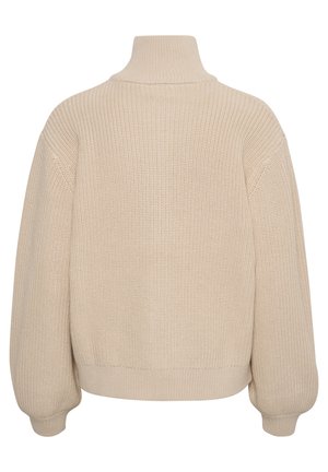 Pull beige à col roulé en maille épaisse avec de longues manches bouffantes et des poignets et ourlet côtelés, vu de dos.