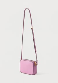 Pink leather crossbody bag with a rectangular shape, adjustable strap, gold zipper, and textured surface.
