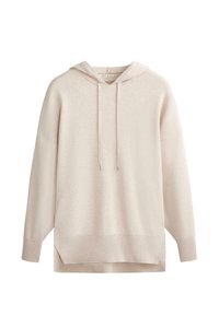 Hoodie oversize beige clair avec manches longues, poignets et ourlet côtelés, cordons de serrage à l'avant et détail d'ourlet fendu.