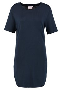 Abito blu navy a maniche corte realizzato in tessuto morbido, caratterizzato da un collo rotondo, una forma rilassata e spacchi laterali per una maggiore libertà di movimento.