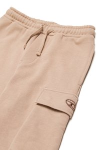 Beige sweatpants van zachte stof, met een elastische tailleband, trekkoord, zijzak en een flapzak met een logo-label.