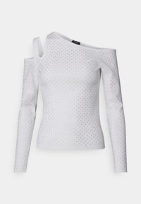 Top bianco a maniche lunghe con design a spalla unica, decorato con strass sparsi, realizzato in un materiale liscio e elastico.