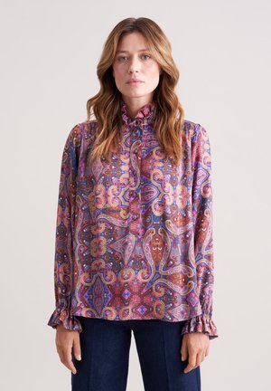 Kleurige blouse met paisleymotief, versierd met een gerimpelde halslijn en manchetten, gemaakt van lichte stof. Lange mouwen en een losse pasvorm, met complexe ontwerpen.