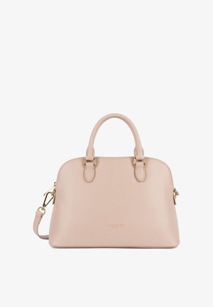 Sac à main en cuir texturé beige avec deux poignées rondes, bandoulière amovible et ferrures dorées.
