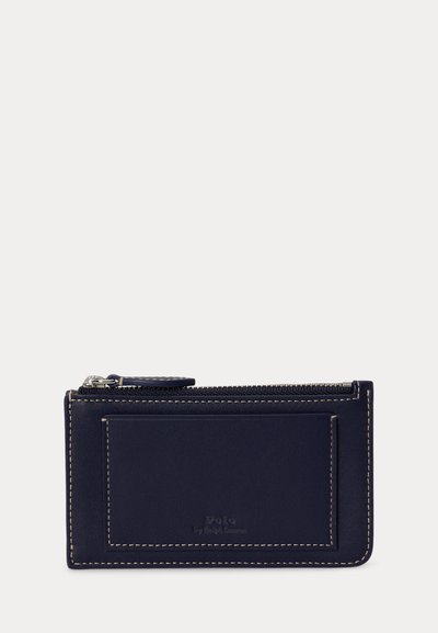 Porte-cartes en cuir bleu marine avec fermeture éclair, poche avant et couture blanche, marqué "Polo par Ralph Lauren".
