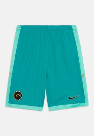 Short de sport bleu sarcelle avec panneaux latéraux bleu clair, taille élastique, logo KM noir et or sur la jambe gauche, et swoosh Nike noir et or sur la jambe droite.