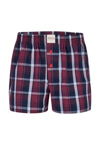 Boxer a scacchi in rosso, blu navy e bianco. Presentano una vita elastica e due bottoni rossi sul davanti. Realizzati in tessuto morbido.