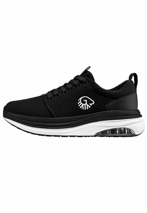 Black sneaker made of textured fabric with a sleek design, featuring a white midsole, transparent air cushion, and black laces.