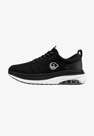 Black sneaker made of textured fabric with a sleek design, featuring a white midsole, transparent air cushion, and black laces.