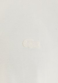 Lacoste T-paita - flour