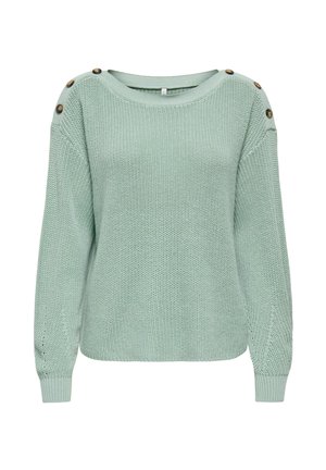 Ljusgrön stickad tröja med långa ärmar och tre dekorativa bruna knappar på varje axel.