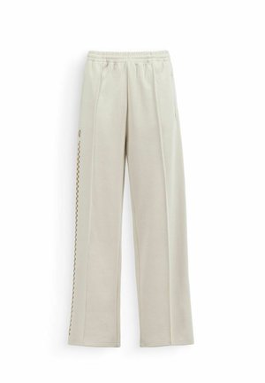 Pantaloni beige a gamba dritta con vita elastica e sottile striscia marrone a quadretti sul lato sinistro.
