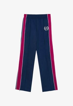 Pantaloni sportivi blu navy con una striscia laterale rosa e dettagli bianchi. Presentano una vita elastica e un logo di Boston sul davanti.