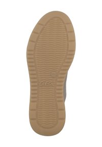 Tan rubber sole with a wavy texture; features ridges for grip and a circular logo. The upper portion is not visible in the image.