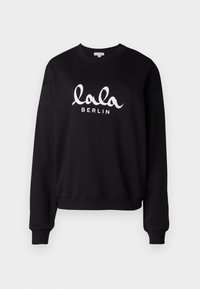 Čierna mikina s rebrovaným výstrihom a manžetami. Na prednej strane je nápis "lala BERLIN" napísaný kurzívou v bielej farbe. Mäkká textúra.