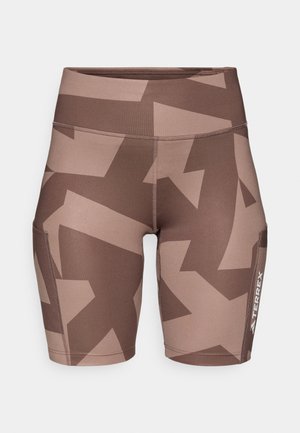 Shorts de sport marron avec un motif géométrique aux nuances variées. Caractéristiques : une ceinture large et une poche latérale. Le matériau semble extensible.