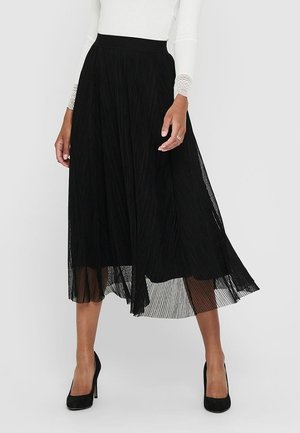 Jupe midi plissée noire avec une taille élastique, fabriquée en tissu léger ; présente un design fluide et une légère transparence au bord.