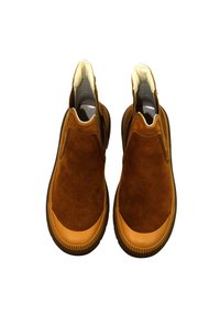 Brown suede slip-on shoes with a tan rubber toe cap and textured sole, featuring a low-cut design and soft lining for comfort.
