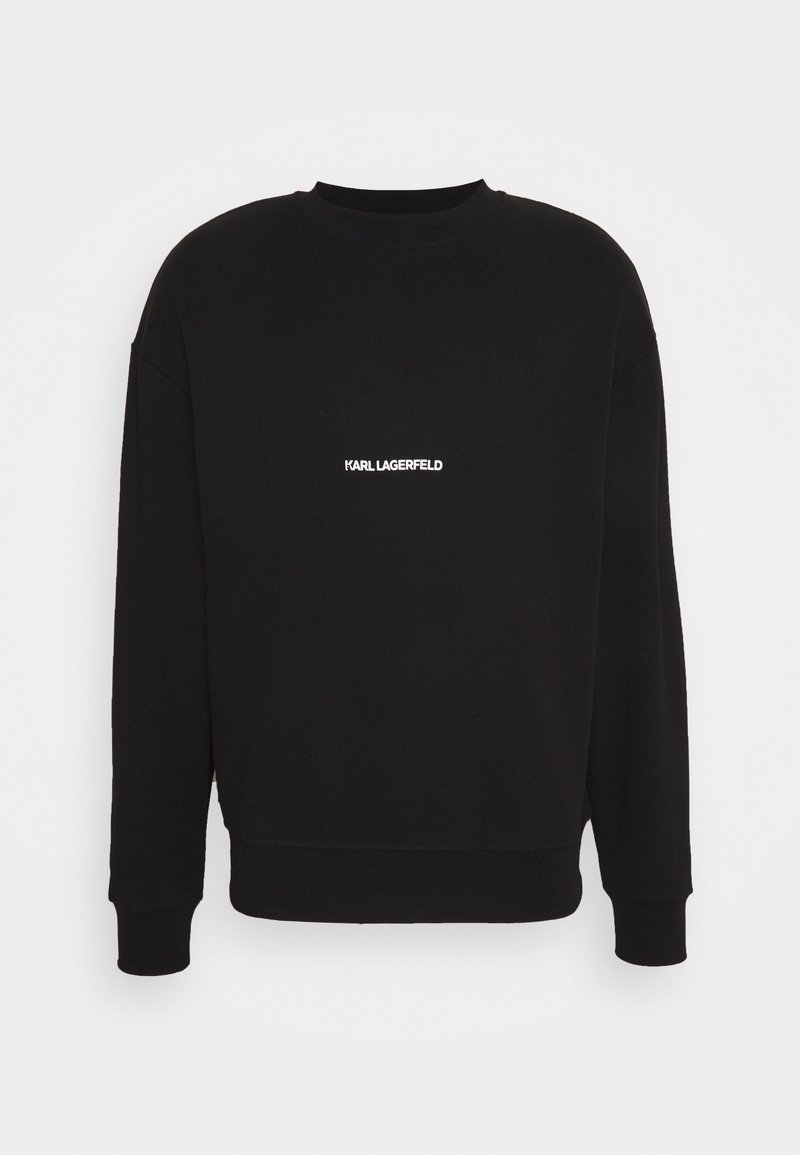 Czarna bluza z okrągłym dekoltem, ściągaczami na rękawach i u dołu. Na piersi biały napis "KARL LAGERFELD". Miękka tekstura materiału.