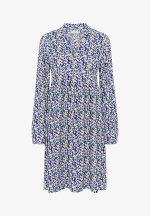 Kwiecista sukienka z długimi rękawami, dekoltem w serek i marszczonym stanem. Posiada żywe niebieskie, różowe i zielone kwiaty na białym tle.