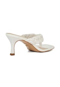 White high-heeled mules with a woven strap design and square toe. Features a slim, contoured heel and a smooth leather texture.