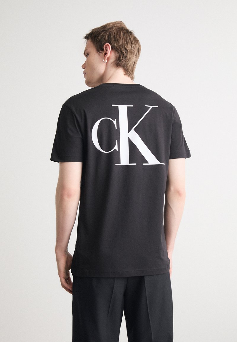 Calvin Klein Jeans REGULAR FIT TEE WITH BOLD BACK PRINT - T-shirt con stampa - black