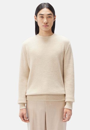 Stickad tröja - off white