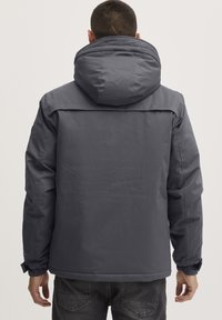 Gray insulated jacket featuring a hood, adjustable cuffs, and a smooth texture. Simple design with no visible patterns or hardware details.