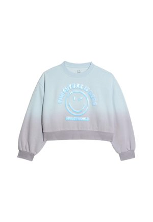 Sweatshirt cropped bleu clair avec un dégradé vers le gris, mettant en avant un graphique de visage souriant et le texte "L'AVENIR EST ICI" en bleu. Tissu doux.