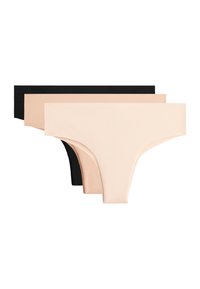 Drie paar naadloze ondergoed in zwart en twee tinten beige, in een rij gerangschikt, die een gladdige stoftextuur tonen.