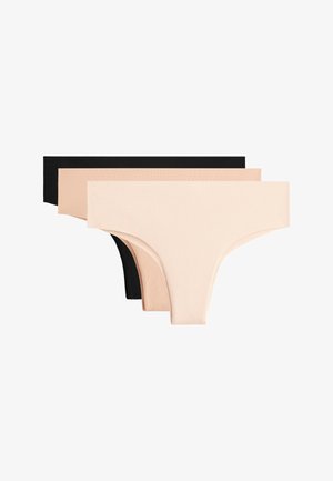 Tři páry bezešvého spodního prádla v černé a dvou odstínech béžové, uspořádané v řadě, což ukazuje hladkou texturu látky.