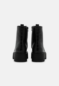 Call it Spring Stivaletti con plateau - black