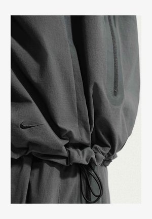 Nike Sportswear, M NK DF TCH WVN WR FZ JKT - Lichte jas - black black black