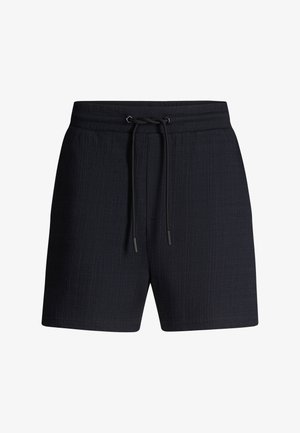 Zwarte textuurshorts met een elastische tailleband en zwarte trekkoorden aan de voorkant, getoond tegen een witte achtergrond.