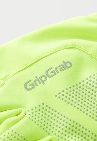 Neonowe żółte rękawice rowerowe z teksturowanym uchwytem i logo "GripGrab". Gładki materiał z kropkowanymi wzorami dla lepszego chwytu.