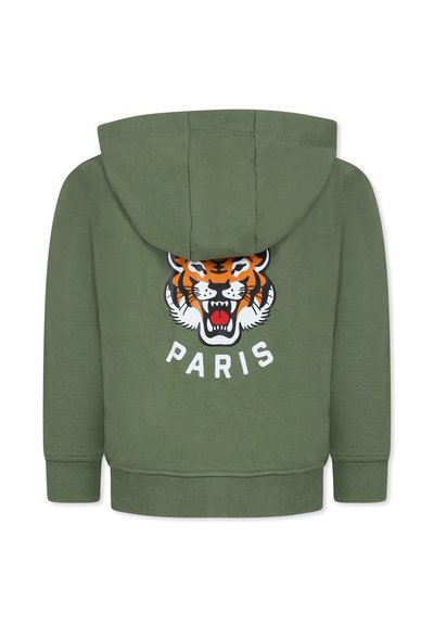 Hoodie vert olive avec un graphisme de tigre et le texte "PARIS" au dos. Doté d'une capuche avec cordon de serrage et de poignets et ourlet côtelés. Texture de tissu douce.