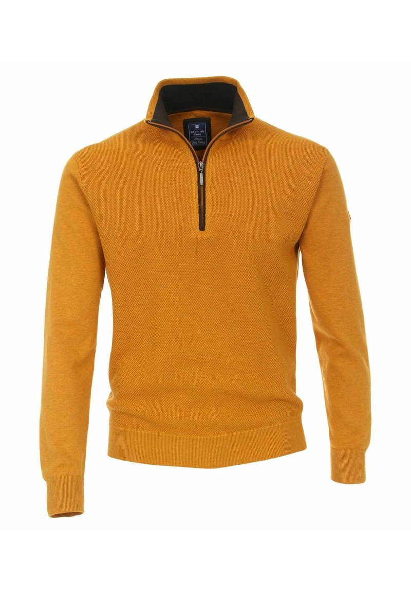 Żółty sweter z dzianiny z kołnierzem na zamek. Teksturowany wzór na całej powierzchni oraz ściągacze przy mankietach i na dole. Kontrastowe ciemne wnętrze kołnierza.