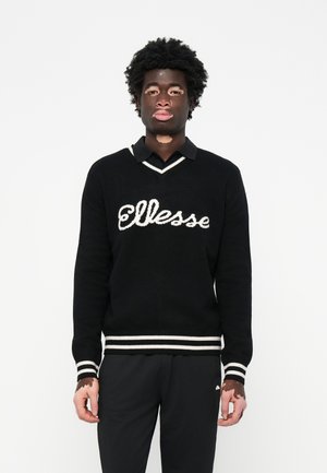 Black knitted sweater with white stripes at cuffs and hem, featuring a prominent "Ellesse" logo across the chest and a V-neck design.