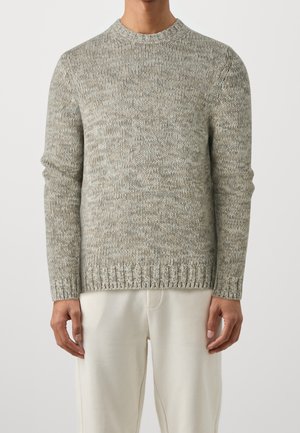 Stickad tröja - beige