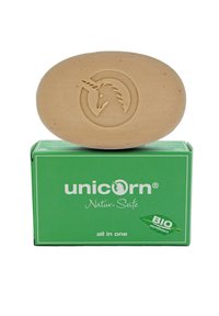 Biodegradable soap in oval brown bar with a unicorn logo. Packed in a green box labeled "unicorn Natur-Seife" with a BIO certification.