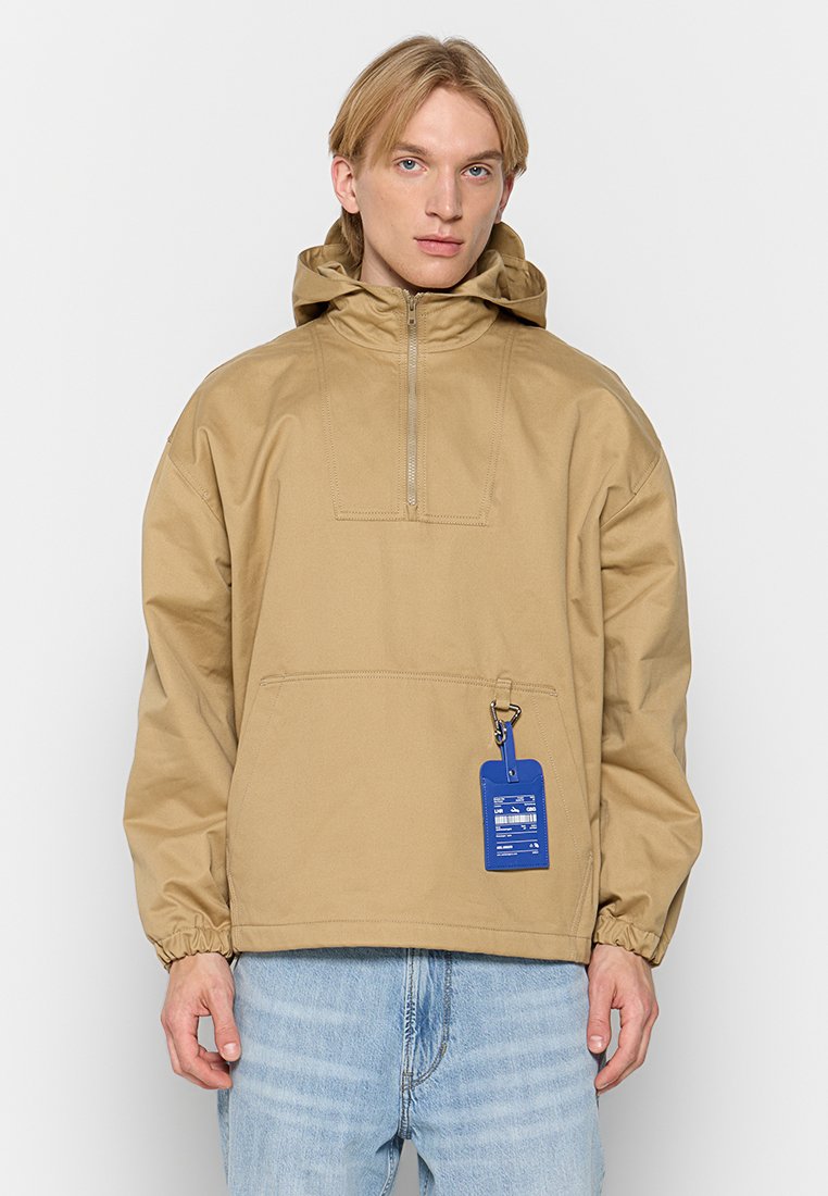 Axel Arigato Lichte jas beige