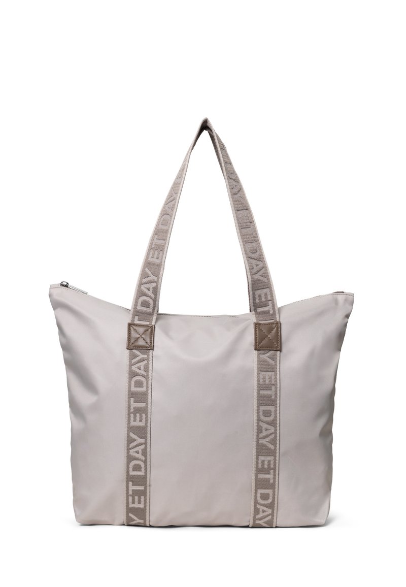 Duża beżowa torba na ramię wykonana z gładkiego materiału, z dwiema plecionymi rączkami z napisem "ET DAY" oraz zamkiem błyskawicznym u góry dla zapewnienia bezpiecznego dostępu.