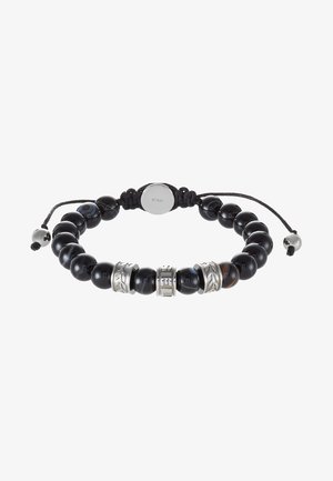 Bracciale nero di perline con accenti in argento, caratterizzato da perline rotonde lucide ed elementi metallici decorativi. Dettaglio di cordino in tessuto regolabile.