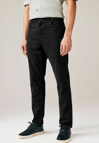 Next SUMMERWEIGHT COTTON - Jeans Tapered Fit - black