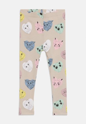 Beige kinderleggings met herhaalde cartoon dieren gezichten binnen pastelgekleurde harten in roze, blauw, geel, wit en groen.