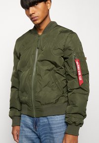 Alpha Industries MA-1 LOGO PUFFER - Pilotska jakna - dark olive