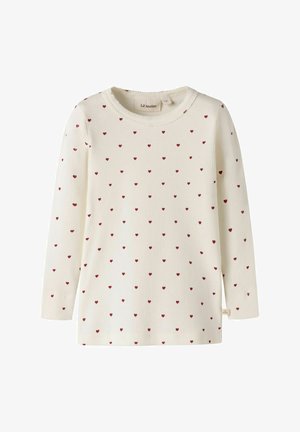 Maglietta crema a manica lunga a coste con piccoli motivi a cuore rossi distribuiti uniformemente sul tessuto.