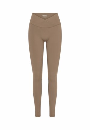Hnedé legíny s vysokým krížovým pásom. Vyrobené z hladkého, elastického materiálu. Tvarovaný dizajn, ktorý sa zužuje pri členkoch. Žiadne viditeľné vzory.